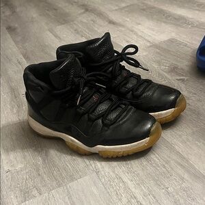 Jordan Black and Gold Sneakers